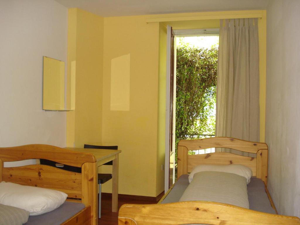 Hostel Lion Lodge Luzern Lucerne Quarto foto